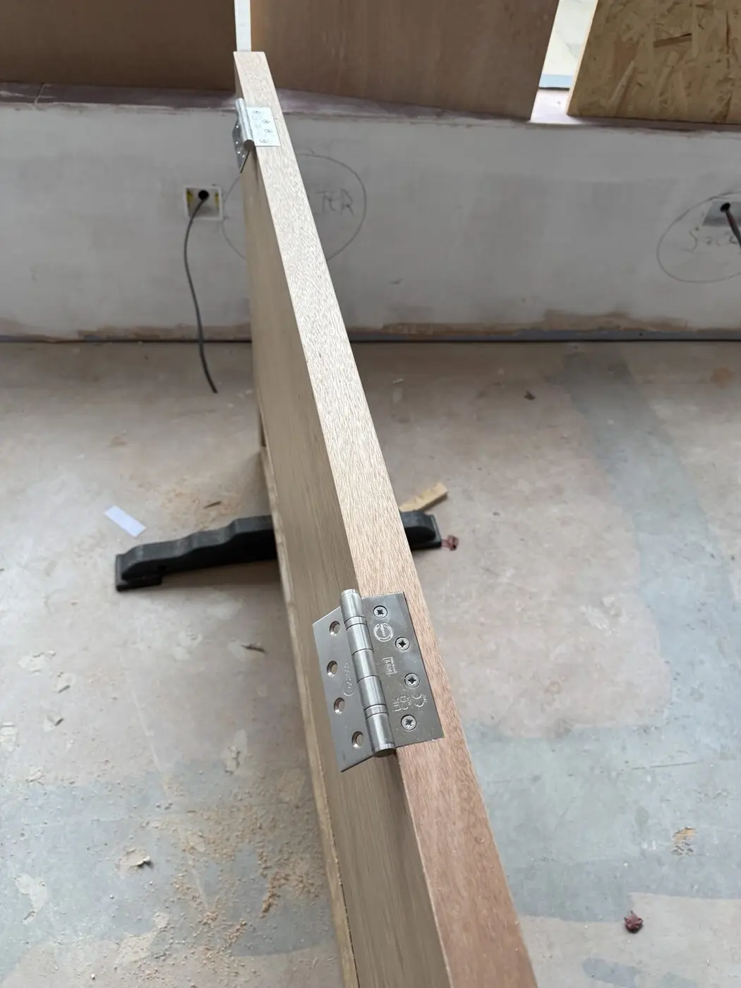 Door edge measured for accurate hinge and ironmongery fitting
