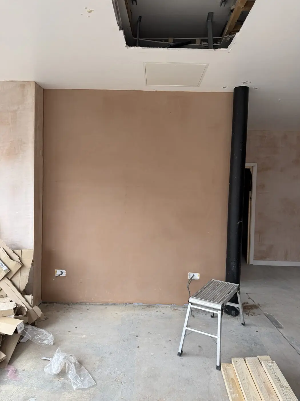 Newly plastered wall with smooth even finish in Newcastle property